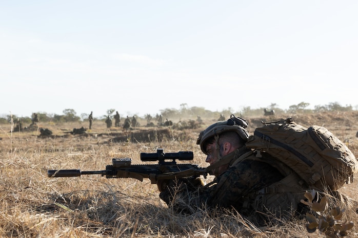 U.S. Marine Corps Lance Cpl. Seth Wilson, rifleman with Echo Company, 2nd Battalion, 5th Marine Regiment, provides cover fire after exiting a Brazilian Amphibious Armored Vehicle for a frontal assault, Aug. 5, 2023, in Formosa, Brazil, during the Corpo de Fuzileiros Navais’ annual Infantry Training Exercise Formosa. Exercise Formosa offers an ideal platform for the armed forces of multiple nations to enhance their interoperability, conduct joint military operations, and exchange invaluable insights on tactics and strategies. With the backdrop of an ever-changing global security landscape, the participation of the United States Marine Corps and militaries from multiple nations shows commitment to regional security and partnership. Wilson is from L'Ance, Michigan.