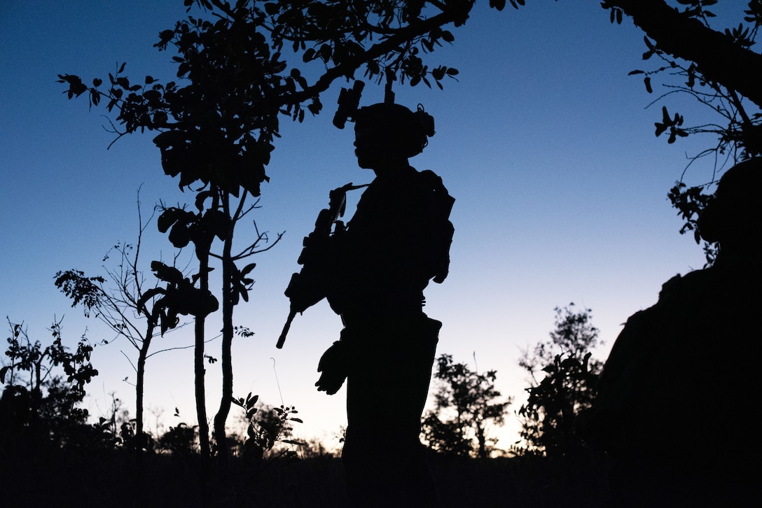 U.S. Marine Corps Sgt. Jake Periman with Echo Company, 2nd Battalion, 5th Marine Regiment, prepares for a night patrol during defensive tactics training, Aug. 6, 2023, at the Base Expedicionaria de Fuzileiros Navais in Formosa, Brazil, during the Corpo de Fuzileiros Navais’ (Brazilian Marine Corps’) annual Infantry Training Exercise Formosa. Exercise Formosa offers a platform for the armed forces of multiple nations to enhance their interoperability, conduct joint military operations, and exchange insights on tactics and strategies. With the backdrop of an ever-changing global security landscape, the participation of the United States Marine Corps and militaries from multiple nations shows commitment to regional security and partnership. Periman is from Kansas City, Mo.