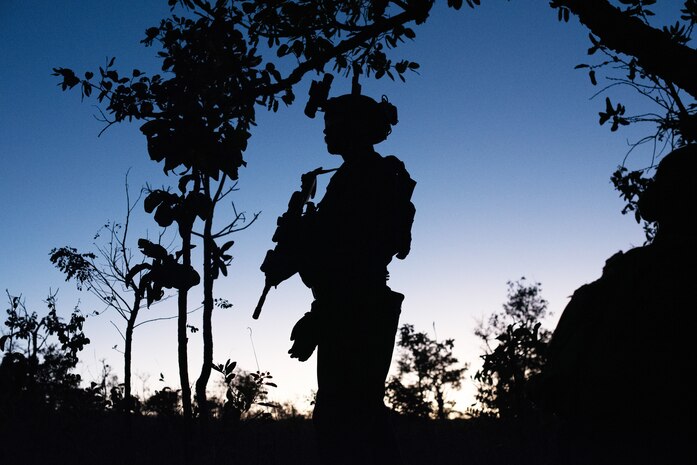 U.S. Marine Corps Sgt. Jake Periman with Echo Company, 2nd Battalion, 5th Marine Regiment, prepares for a night patrol during defensive tactics training, Aug. 6, 2023, at the Base Expedicionaria de Fuzileiros Navais in Formosa, Brazil, during the Corpo de Fuzileiros Navais’ (Brazilian Marine Corps’) annual Infantry Training Exercise Formosa. Exercise Formosa offers a platform for the armed forces of multiple nations to enhance their interoperability, conduct joint military operations, and exchange insights on tactics and strategies. With the backdrop of an ever-changing global security landscape, the participation of the United States Marine Corps and militaries from multiple nations shows commitment to regional security and partnership. Periman is from Kansas City, Mo.