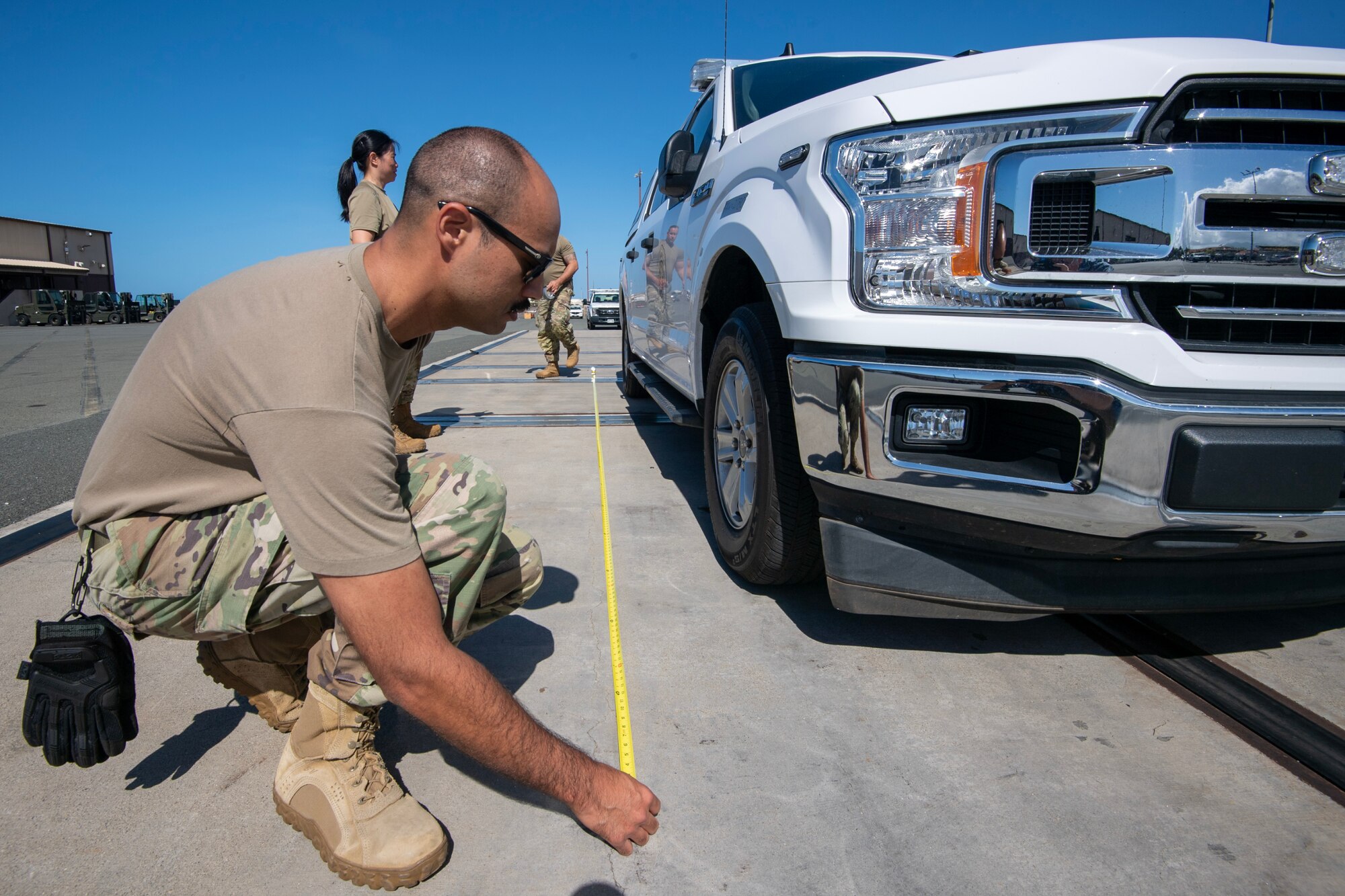 Master Sgt. Shane Costa, 48th Aerial Port Squadron assigned to the 624th Regional Support Group, performed a joint inspection on vehicles from the Honolulu Fire Department and cargo in response to the wildfires on the island of Maui, Joint Base Pearl Harbor-Hickam, Hawaii, Aug. 10, 2023.