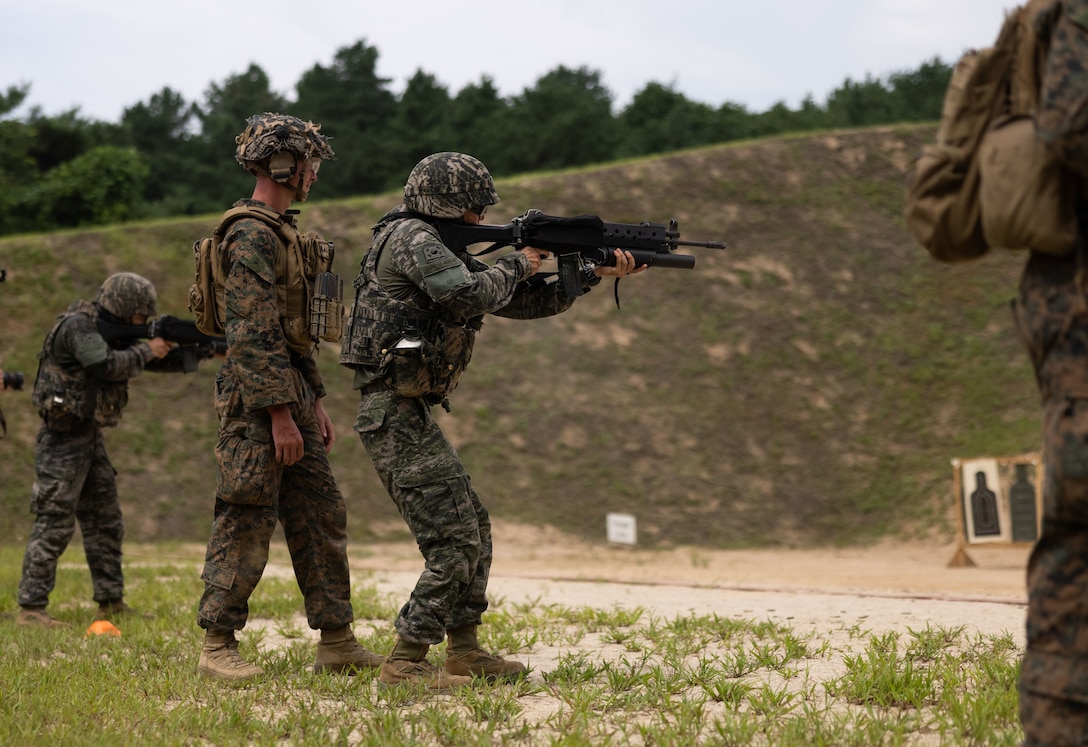 U.S. Marines with 3d Littoral Combat Team, 3d Marine Littoral Regiment, 3d Marine Division, fire Mk 19 grenade launchers during a live fire range at Marine Corps Base Hawaii, August 2, 2023. The purpose of this exercise is to sharpen the LCT’s weapons handling skills and increase their readiness for future exercises and operations. (U.S. Marine Corps photo by Lance Cpl. Malia Sparks)