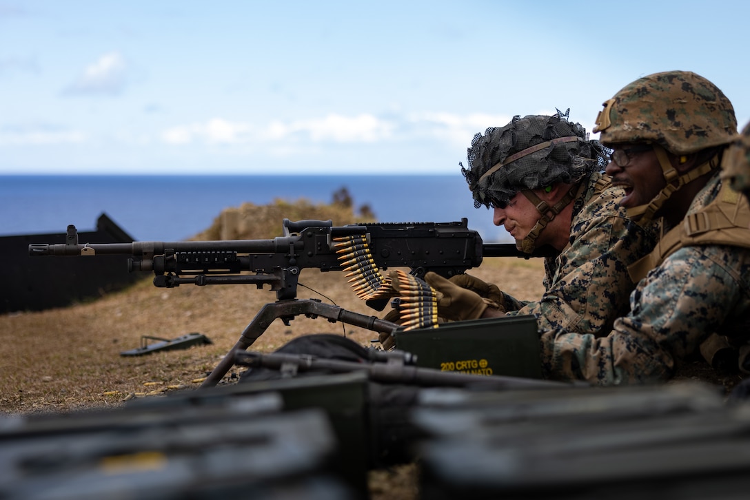 U.S. Marines with 3d Radio Battalion, III Marine Expeditionary Force Information Group, fire an M240B machine gun during a multi-weapons systems range at Marine Corps Base Hawaii, August 14, 2023. The purpose of this training is to sharpen the Marines’ weapons handling skills and increase their readiness for future exercises and operations. Alpha Company, 3d RadBn, provides support to 3d Marine Littoral Regiment during various training exercises. (U.S. Marine Corps photo by Lance Cpl. Malia Sparks)
