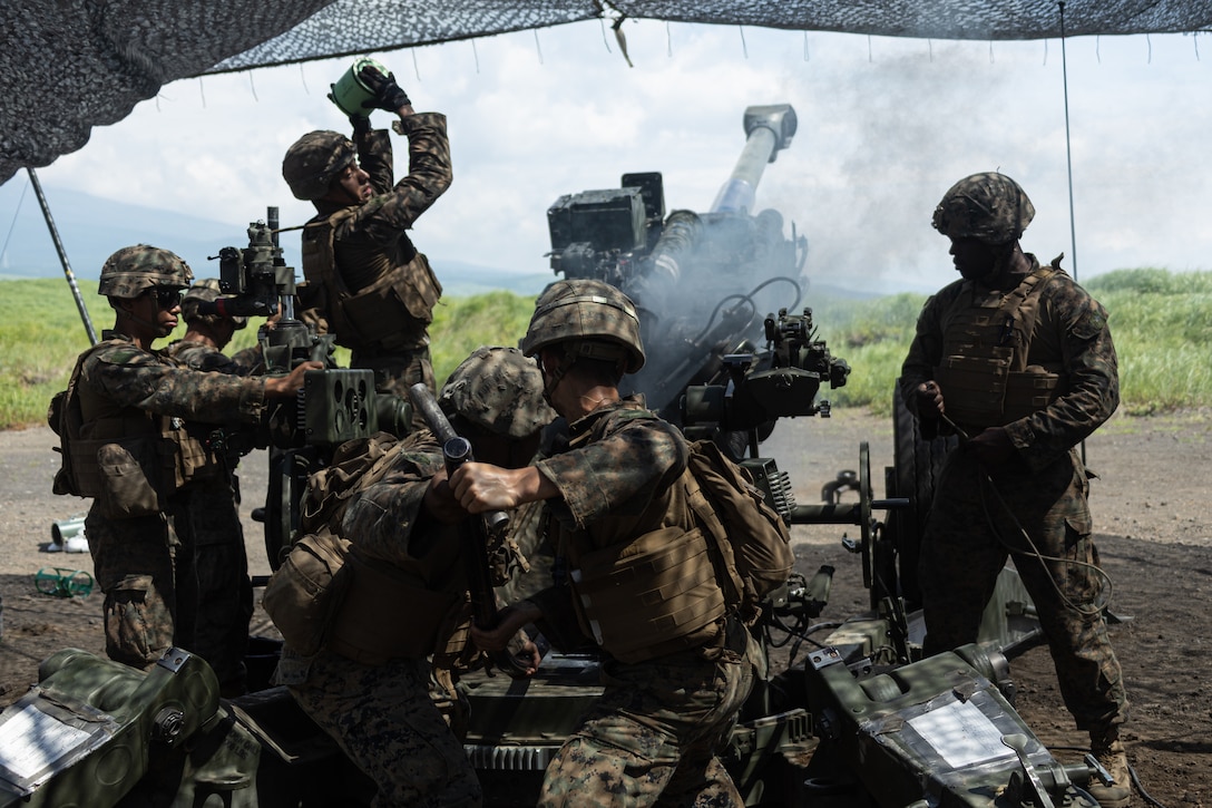 U.S. Navy Corpsmen and Marines transport a simulated casualty onto a Japan Ground Self-Defense Force UH-1 helicopter during a medical evacuation drill during at Artillery Relocation Training Program 23.2 at Combined Arms Training Center, Camp Fuji, Japan, July 13, 2023. ARTP provides Marines the opportunity to rehearse realistic scenarios across a range of climates and conditions, providing combat ready forces in the Indo-Pacific. The U.S. service members are with 3d Battalion, 12th Marines, 3d Marine Division. The JGSDF helicopter is with Eastern Army Helicopter, 2nd Aviation Unit. (U.S. Marine Corps photo by Lance Cpl. Evelyn Doherty)