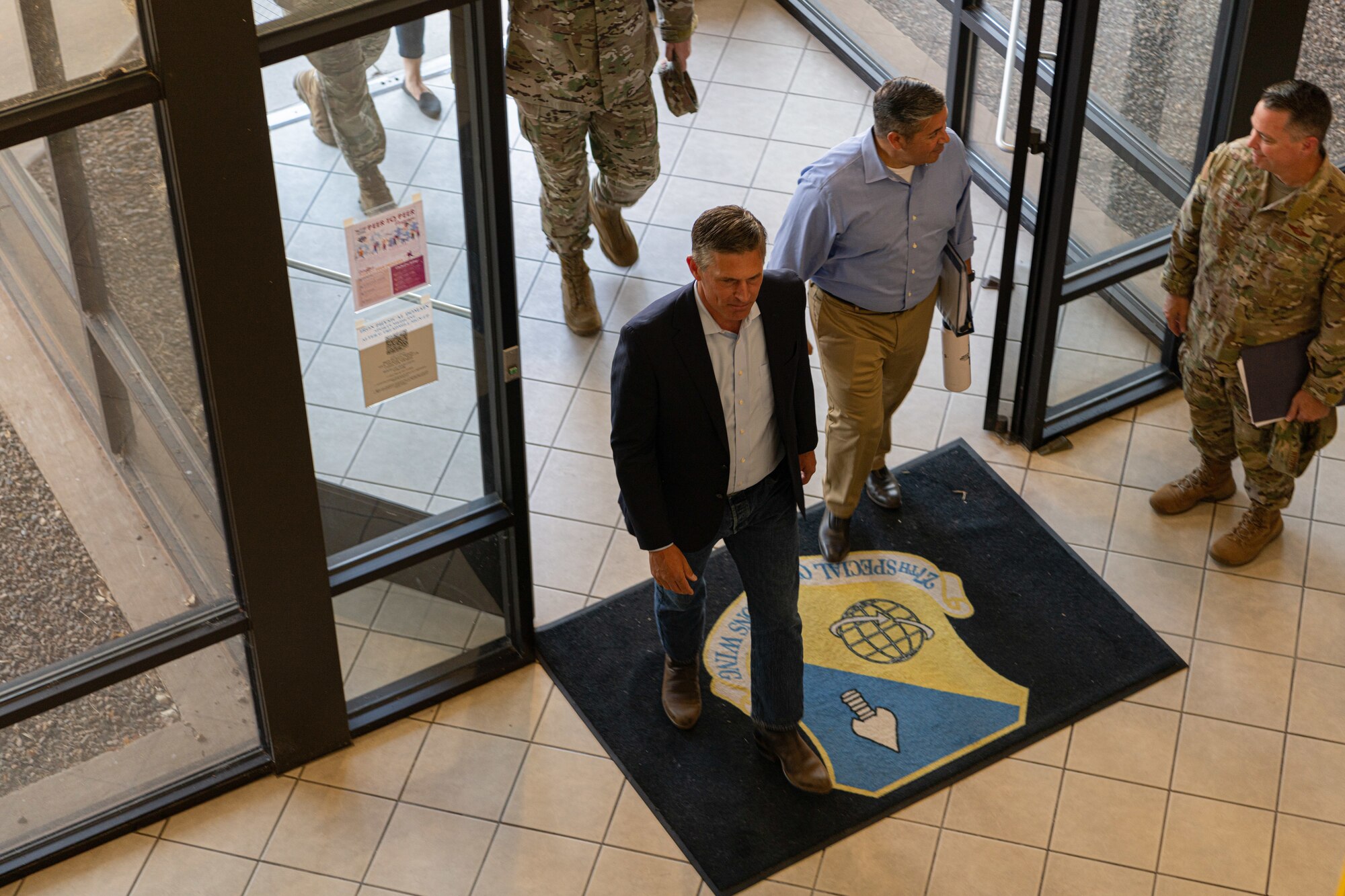 New Mexico Senators Martin Heinrich and Ben Ray Lujan arrive at the 27th Special Operations Wing headquarters during a visit to Cannon Air Force Base, N.M., Aug. 22, 2023. Lt. Gen. Tony Bauernfeind, Air Force Special Operations Command commander and the 27 SOW leadership team hosted a meeting to discuss transforming AFSOC force structure for a fifth power projection wing, greater force development, and growth for Air Commandos with congressional and community leaders. (U.S. Air Force photo by Senior Airman Drew Cyburt)