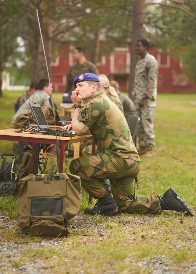 A Norwegian soldier stands ready to receive commands for a simulated fire mission at a FIRES Summit in Setermoen, Norway, August 21, 2023. The event, hosted by the Norwegian Armed Forces, strengthens interoperability with our Norwegian allies and allows the U.S. to demonstrate its technology and capabilities in the Arctic region. (U.S. Marine Corps photo by Master Sgt. Robert Brown)