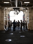 U.S. Marine Corps Col. Matthew Good, Deputy Commander of Fleet Marine Force, Atlantic, Marine Forces Command, Marine Forces Northern Command (MARFORCOM), integrates with U.S. Navy personnel aboard the amphibious assault ship USS Fort Lauderdale (LPD 28) at Naval Station Norfolk, Virginia, August 18, 2023. Marines with FMFLANT, MARFORCOM, MARFOR NORTHCOM familiarized themselves with Maritime Defense Security Cooperation Agency capability in support of hurricane response. (U.S. Marine Corps photo by Sgt. Hannah Adams)