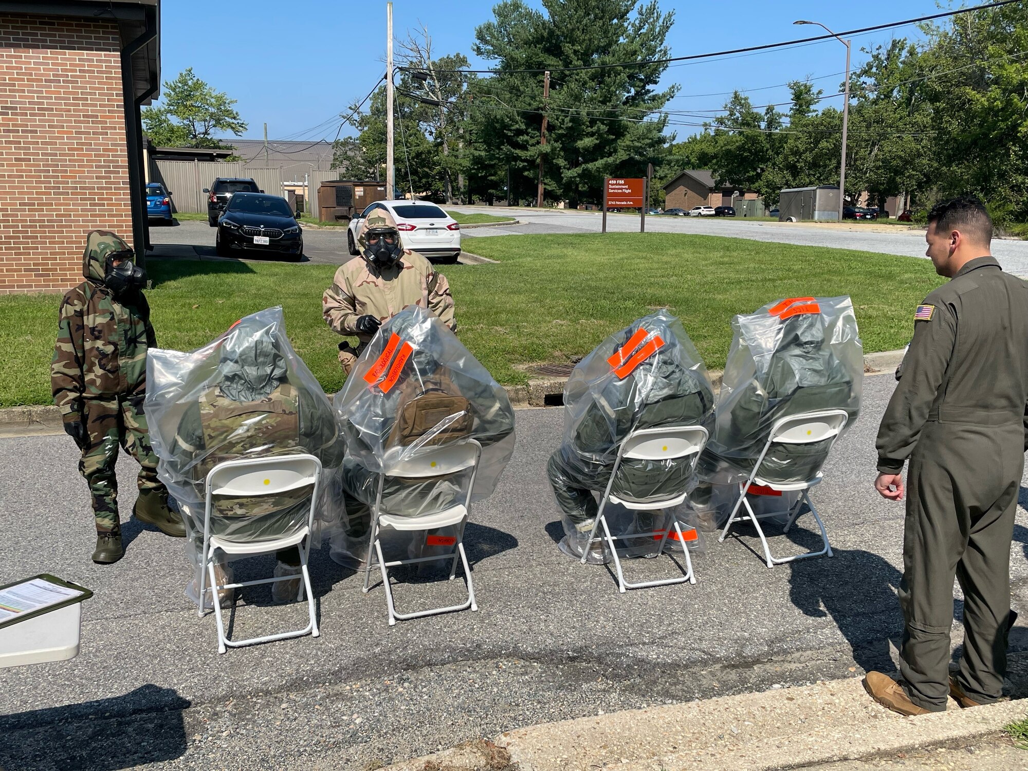 Members of the 756th Air Refueling Squadron conduct chemical, biological, radiological, nuclear (CBRN) training during the August 2023 UTA weekend. (Air Force photo by Col. Roland Tsui)