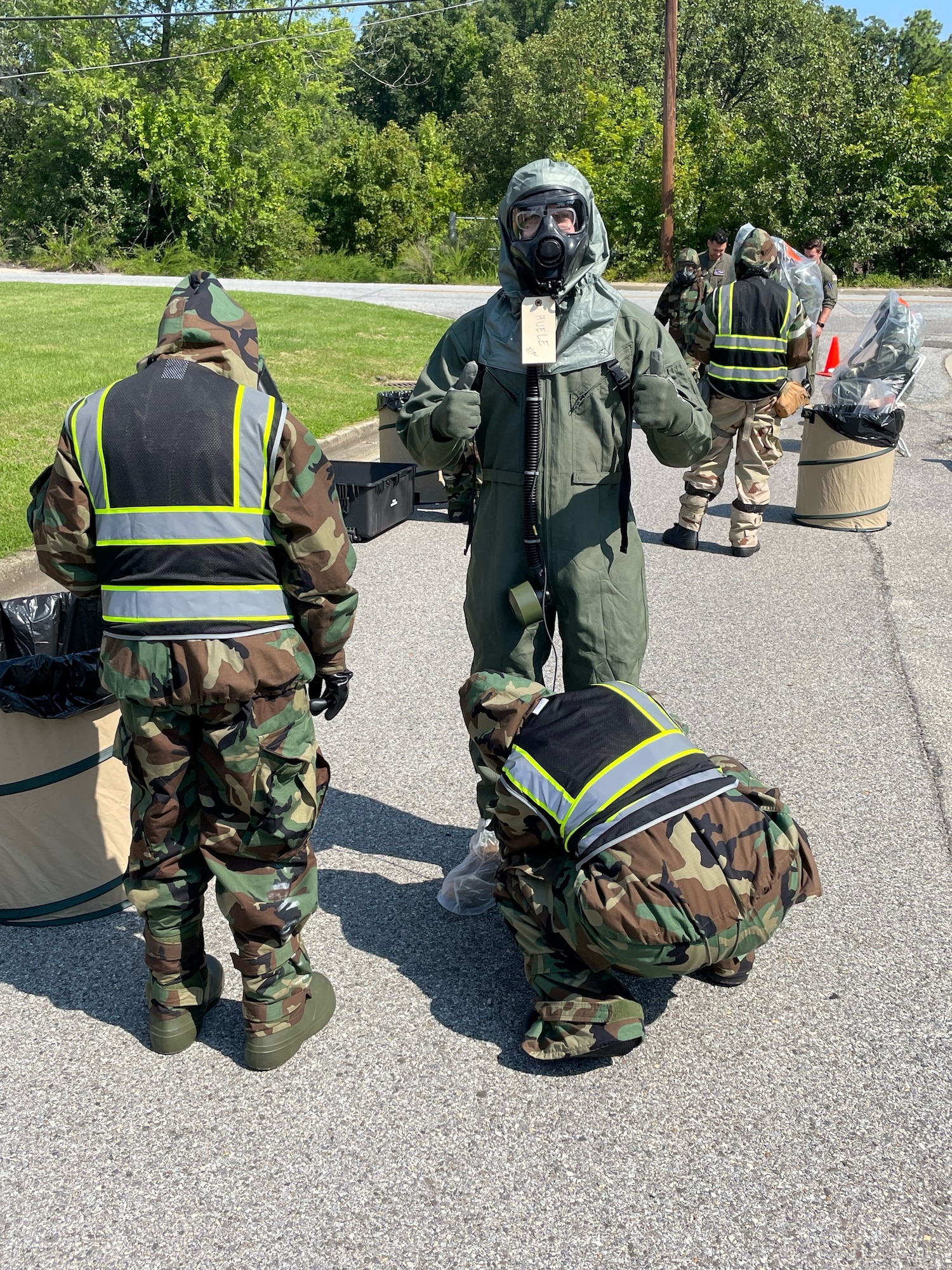 Members of the 756th Air Refueling Squadron conduct chemical, biological, radiological, nuclear (CBRN) training during the August 2023 UTA weekend. (Air Force photo by Col. Roland Tsui)