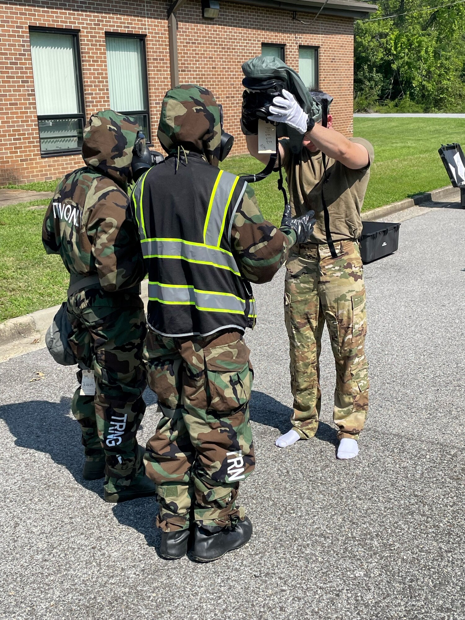 Members of the 756th Air Refueling Squadron conduct chemical, biological, radiological, nuclear (CBRN) training during the August 2023 UTA weekend. (Air Force photo by Col. Roland Tsui)