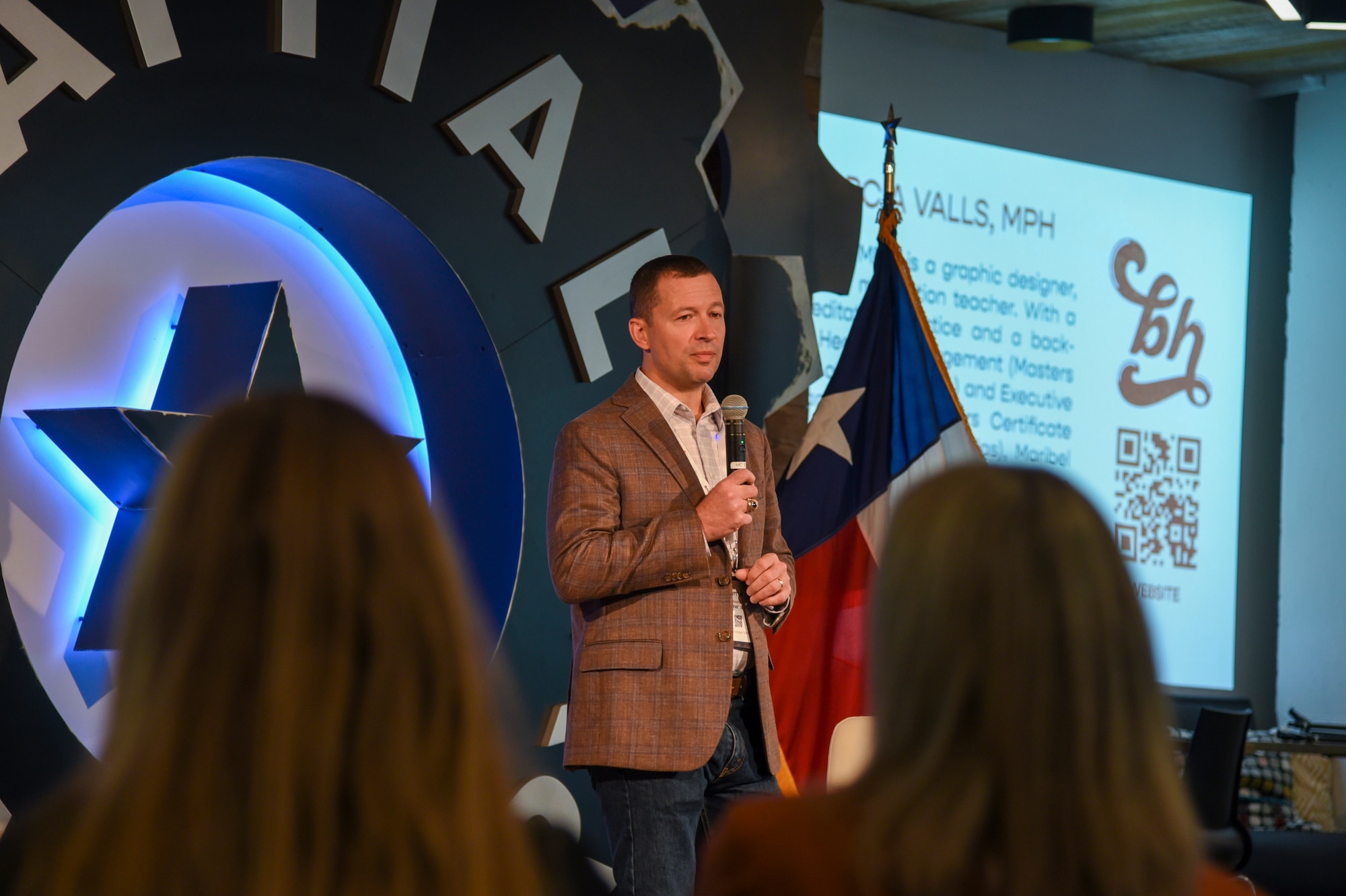 Col. Elliott Leigh, AFWERX director and chief commercialization officer for the Department of the Air Force, kicks off Fed Supernova with 22 minutes of wellness at Capital Factory in Austin, Texas, Aug. 23, 2023. Leigh encourages everyone to take 22 minutes each day to focus on something that brings joy in their life. AFWERX invited Maribel Gabriel Valls, a meditation teacher, to lead a morning mindfulness session to create a lasting habit of self-care and improve long-term well-being. (U.S. Air Force photo by Matthew Clouse)