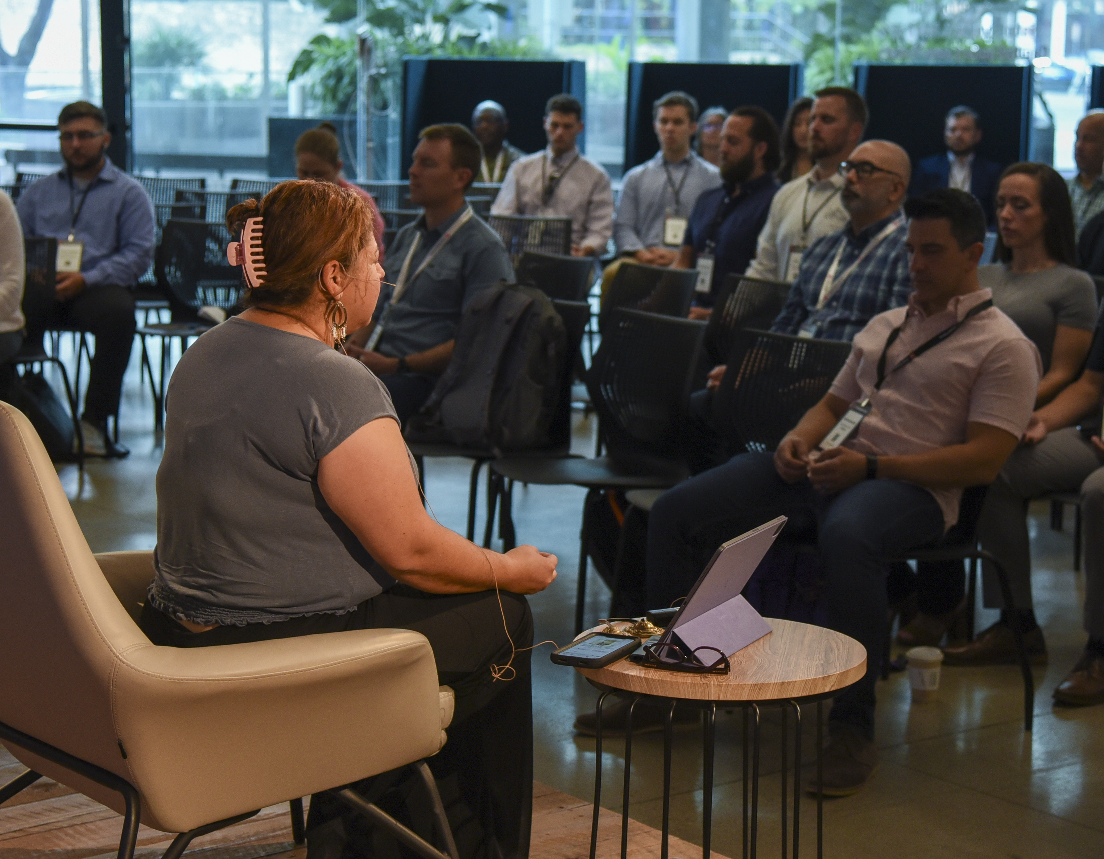 AFWERX kicks off Fed Supernova with 22 minutes of wellness at Capital Factory in Austin, Texas, Aug. 23, 2023. AFWERX invited Maribel Gabriel Valls, a meditation teacher, to lead a morning mindfulness session to create a lasting habit of self-care and improve long-term well-being. Col. Elliott Leigh, AFWERX director and chief commercialization officer for the Department of the Air Force, encourages everyone to take 22 minutes each day to focus on something that brings joy in their life. (U.S. Air Force photo by Matthew Clouse)
