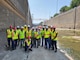 Members of the Brandon Road Interbasin Project Technical Team stand a the bottom of the dewatered lock chamber.