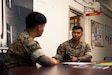 U.S. Marine Corps Sgt. Luis Gomez, a Wheeling, Illinois native and field artillery fire direction control Marine with 1st Battalion, 12th Marines, 3d Marine Division, speaks to Staff Sgt. Ramon Santiago, a Yorktown, Virginia native and joint terminal attack controller with 1st Battalion, 12th Marines, 3d Marine Division, about the Direct Affiliation Program on Marine Corps Base Hawaii, May 12, 2023. The DAP affords qualified active component Marines the opportunity to affiliate with a Selected Marine Corps Reserve unit or the Individual Mobilization Augmentee program following their expiration of active service with no break in service.