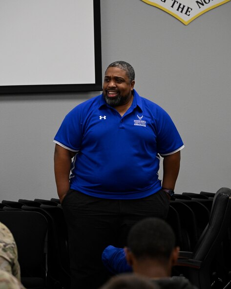 Master Sgt. (Ret.) Kingsley Scott, Air Force Wounded Warrior Program (AFW2) ambassador, talks to Airmen from the 791st Security Forces Squadron Monday Aug. 21, 2023 at Minot Air Force Base, North Dakota. Kingsley told his story of having several people close to him take their own lives, and how Wounded Warrior helped him recover and even be comfortable touring with AFW2 to tell his story of recovering from PTSD. (U.S. Air Force photo by Senior Airman Caleb S. Kimmell)