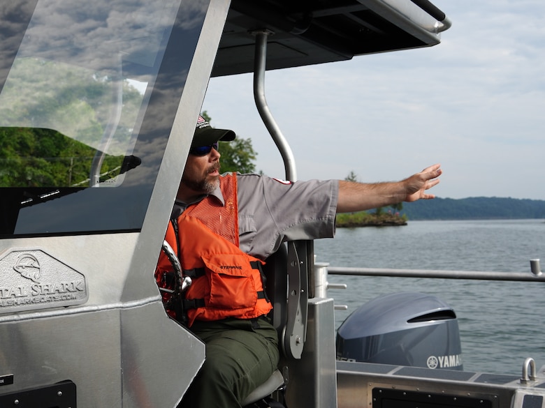 U.S. Army Corps of Engineers, Louisville District Lead Ranger Larry Lemmon discusses a plan for park rangers and Kentucky Fish and Wildlife officers to cordon off a 'drop zone' for paratroopers to jump into Green River Lake, Aug. 5, 2023 in Campbellsville, Kentucky.