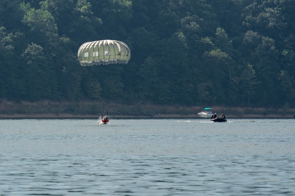 U.S. Army Corps of Engineers, Louisville District park rangers and Kentucky Fish and Wildlife officers cordon off a 'drop zone' for paratroopers to jump into Green River Lake, Aug. 5, 2023 in Campbellsville, Kentucky.