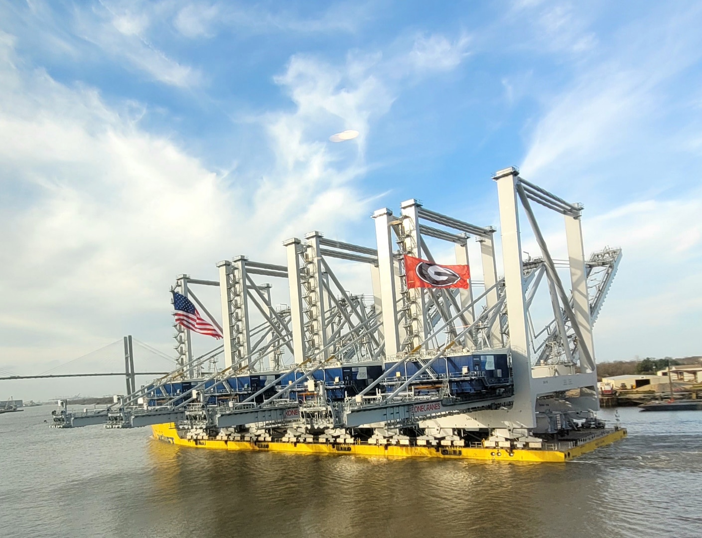 Crew members from Coast Guard Marine Safety Unit Savannah work alongside local partners to escort the motor vessel Biglift Baffin down the Savannah River, Feb. 9, 2023. A safety zone was established around the vessel to protect personnel, vessels, and the marine environment from potential hazards created by the vessel’s transit through the Savannah River. (U.S. Coast Guard photo by Lt. Derek Burke)