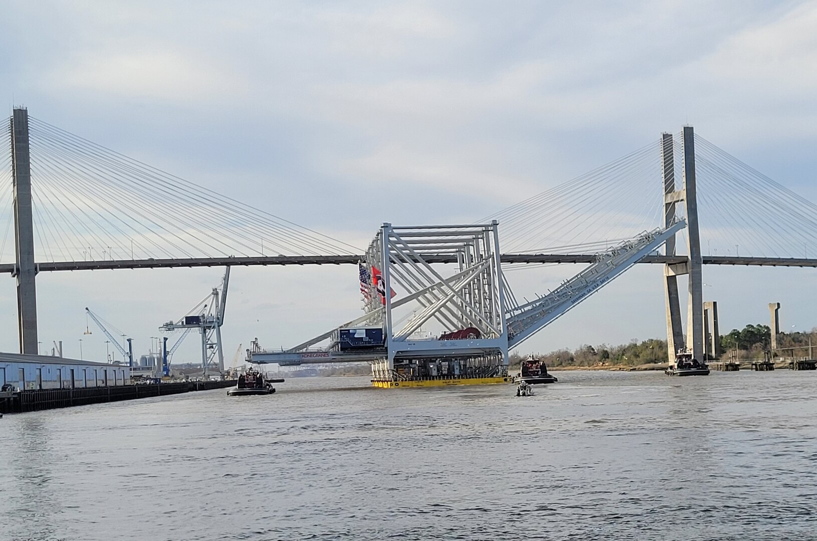 Crew members from Coast Guard Marine Safety Unit Savannah work alongside local partners to escort the motor vessel Biglift Baffin down the Savannah River, Feb. 9, 2023. A safety zone was established around the vessel to protect personnel, vessels, and the marine environment from potential hazards created by the vessel’s transit through the Savannah River. (U.S. Coast Guard photo by Lt. Derek Burke)