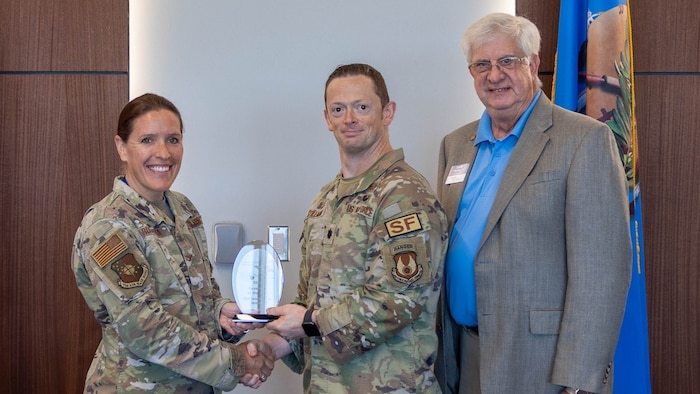 man accepting award