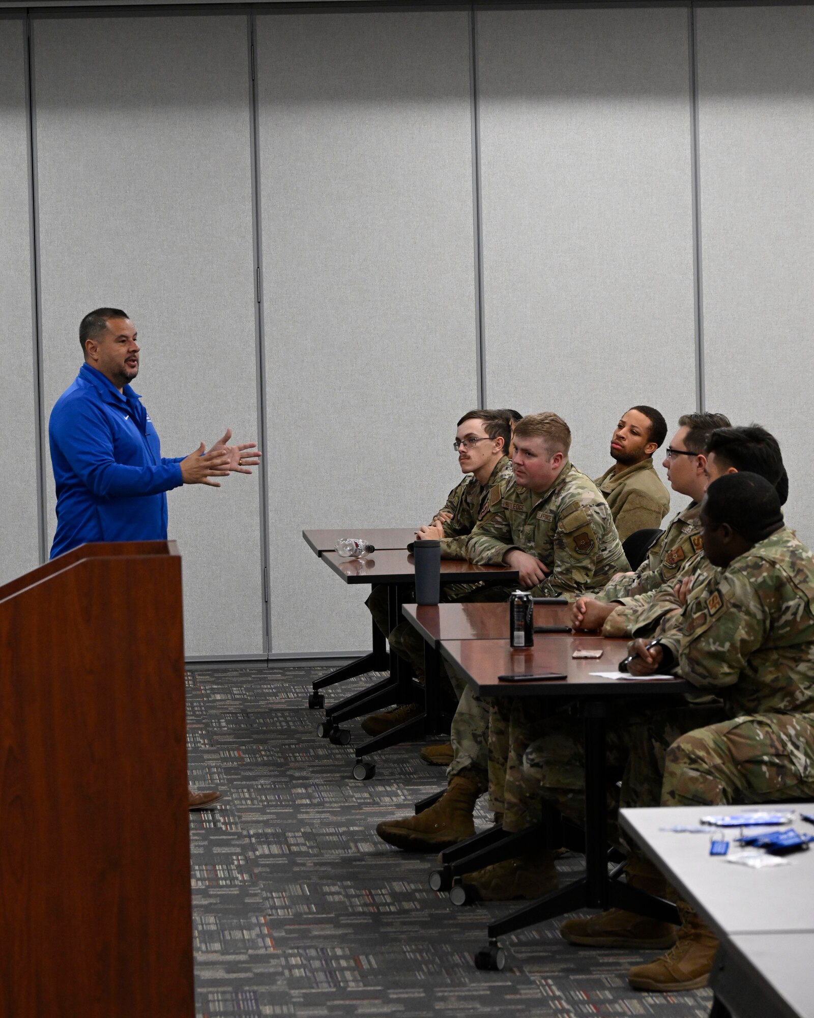 Senior Master Sgt. (Ret.) Carlos Villarreal, outreach ambassador coordinator for Air Force Wounded Warrior Program (AFW2), speaks to Airmen from the 791st Security Forces Squadron Monday Aug. 21, 2023 at Minot Air Force Base, North Dakota. The AFW2 team visits CONUS bases to tell their stories of resiliency and experiences. (U.S. Air Force photo by Senior Airman Caleb S. Kimmell)