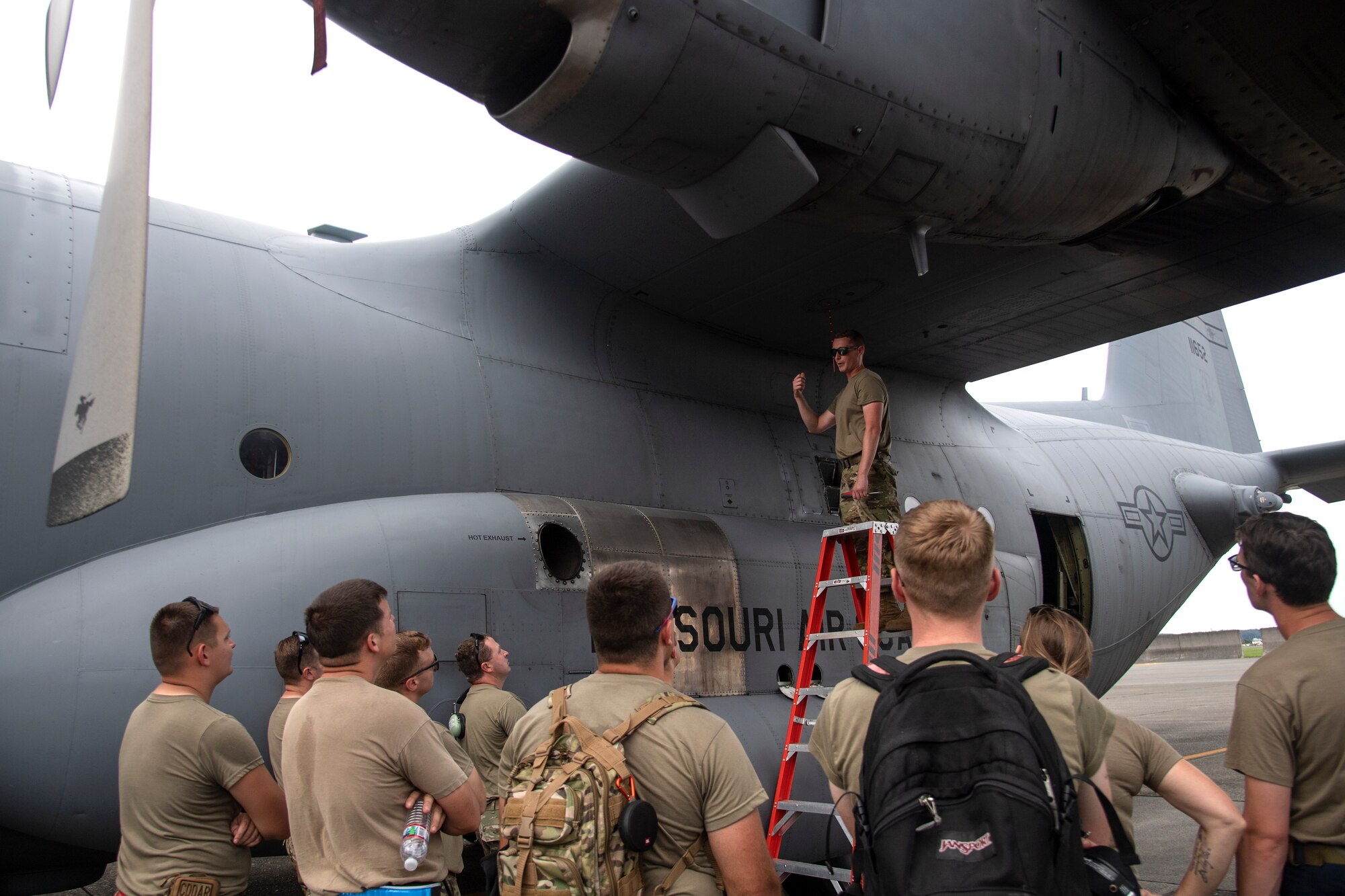 Air National Guardsmen gather by a C-130 Hercules assigned to the Missouri Air National Guard, to train on methods of checking aircraft fuel quantities at Yokota Air Base, Japan, July 15, 2023, in support of Mobility Guardian 2023. Air National Guardsmen from Missouri, Montana and Connecticut worked together as one unit to during to ensure C-130s could perform rapid global mobility in support of MG23. A multilateral endeavor, MG23 features seven participating countries – Australia, Canada, France, Japan, New Zealand, United Kingdom, and the United States – operating approximately 70 mobility aircraft across multiple locations spanning a 3,000-mile exercise area from July 5-21. Our Allies and partners are one of our greatest strengths and a key strategic advantage. MG23 is an opportunity to deepen our connections with regional Allies and partners using bold initiatives. (U.S. Air Force photo by Tech. Sgt. Christopher Hubenthal)