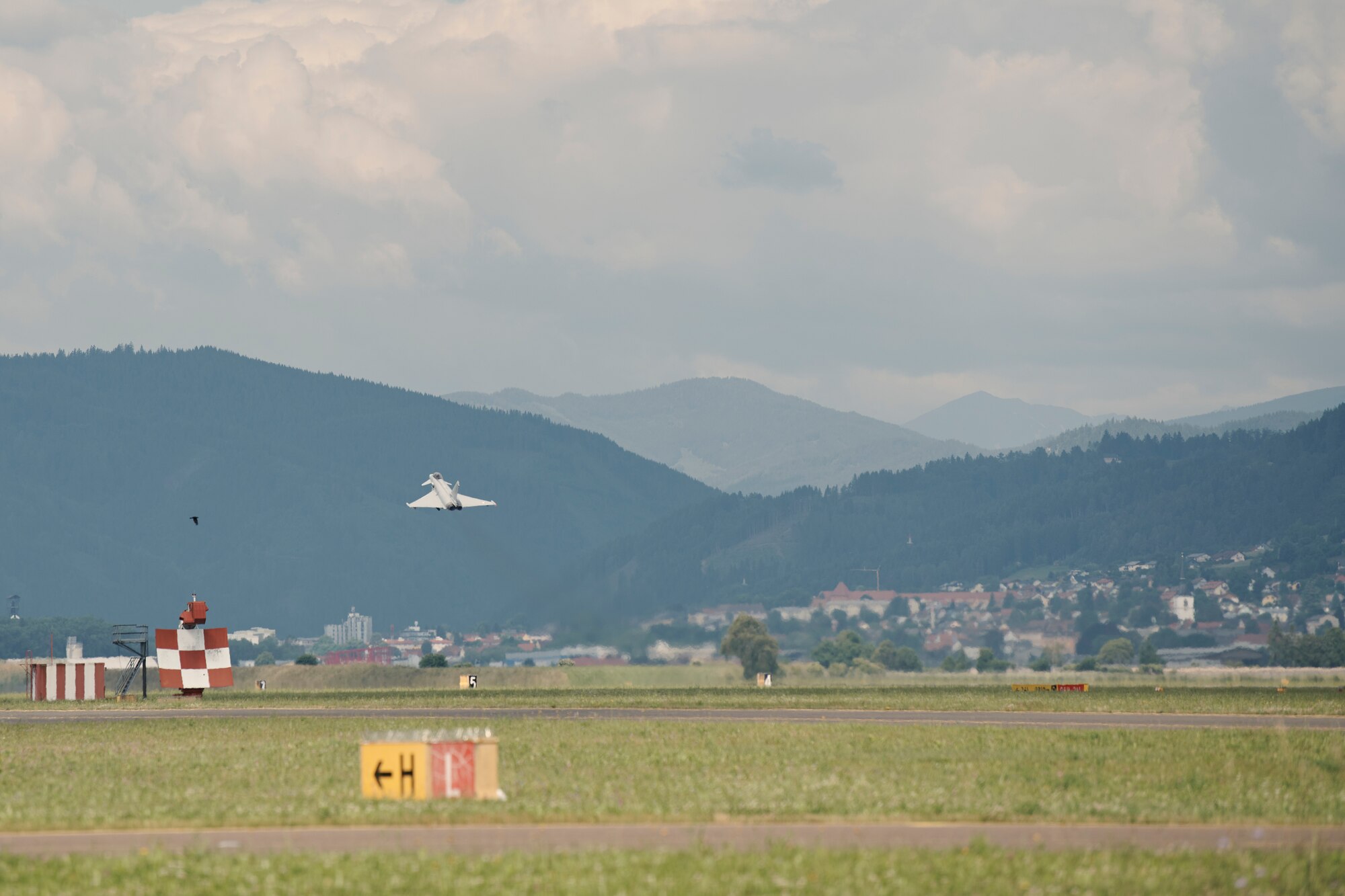 Photo of a Eurofighter Typhoons from the Austrian Air Force's Airspace Surveillance Wing, taking off Hinterstoisser Air Base for the first ever training sortie between Vermont and Austria since signing their State Partnership Program agreement, Zeltweg, Austria, June 17, 2023.