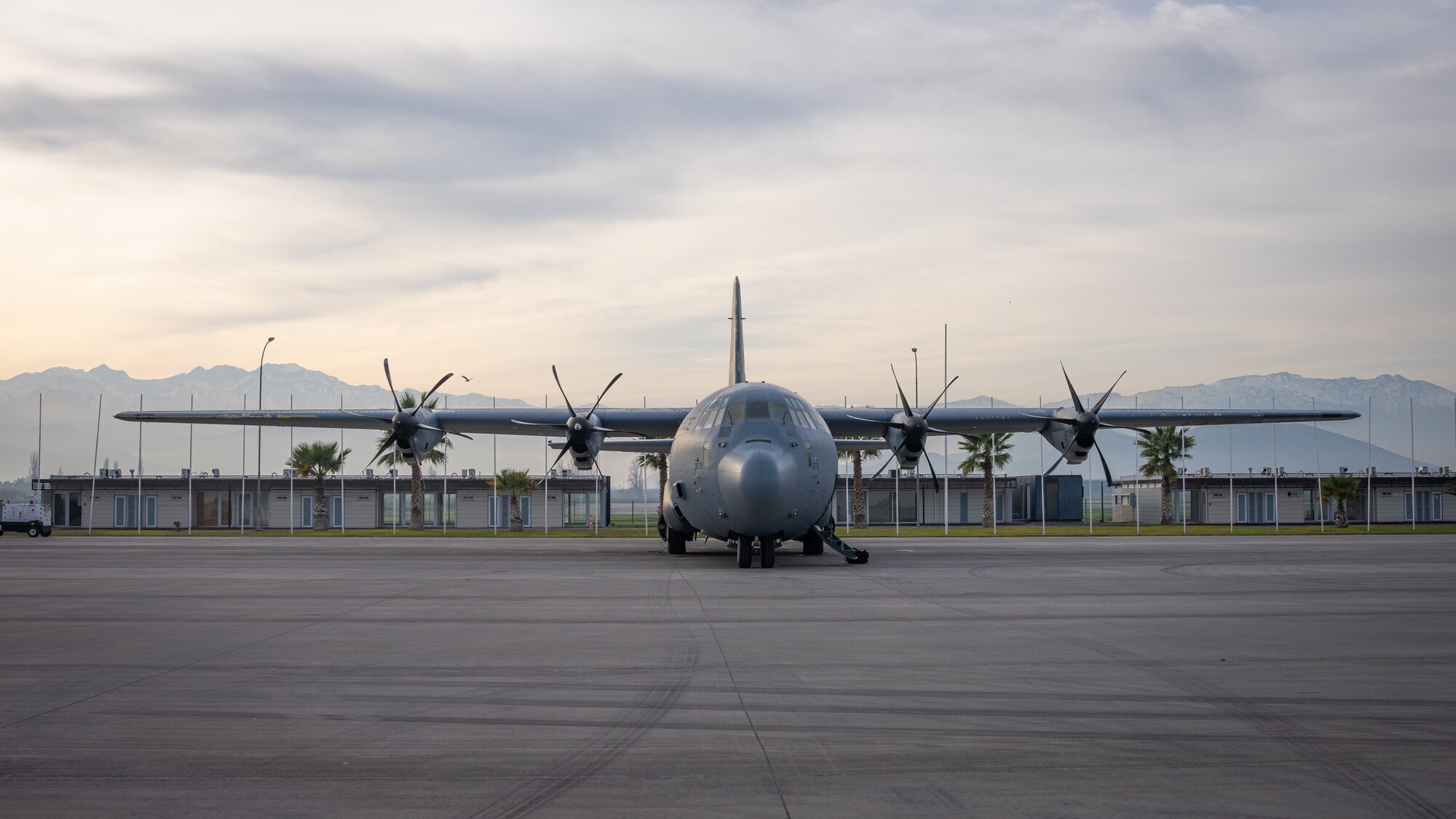 A C-130J Super Hercules from the 39th Airlift Squadron out of the 317th Airlift Wing, Dyess AFB, TX sits on a runway at the Santiago de Chile Airport, Santiago, Chile, July 28, 2023, during exercise Southern Star 23. Exercise Southern Star 23 is a Chilean-led full-scale Special Operations, Joint, and Combined Employment Exercise. The training consists of staff planning, tactical maneuvers, and collaboration among SOUTHCOM components’ staff, Chilean Armed Forces, and interagency partners during a stabilization scenario which facilitates the opportunity for participants to execute and assess the staff’s ability to plan, coordinate and execute command and control, logistical support, and decision-making processes in a crisis scenario. (U.S. Air Force photo by Staff Sgt. Clayton Wear)