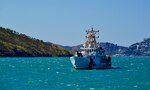 The crew of the USCGC Myrtle Hazard (WPC 1139) arrive to Port Moresby, Papua New Guinea on Aug. 20, 2023. The U.S. Coast Guard is in Papua New Guinea at the invitation of the PNG government to join their lead in maritime operations to combat illegal fishing and safeguard maritime resources following the recent signing and ratification of the bilateral agreement between the United States and Papua New Guinea. (U.S. Coast Guard photo by Chief Warrant Officer Sara Muir)