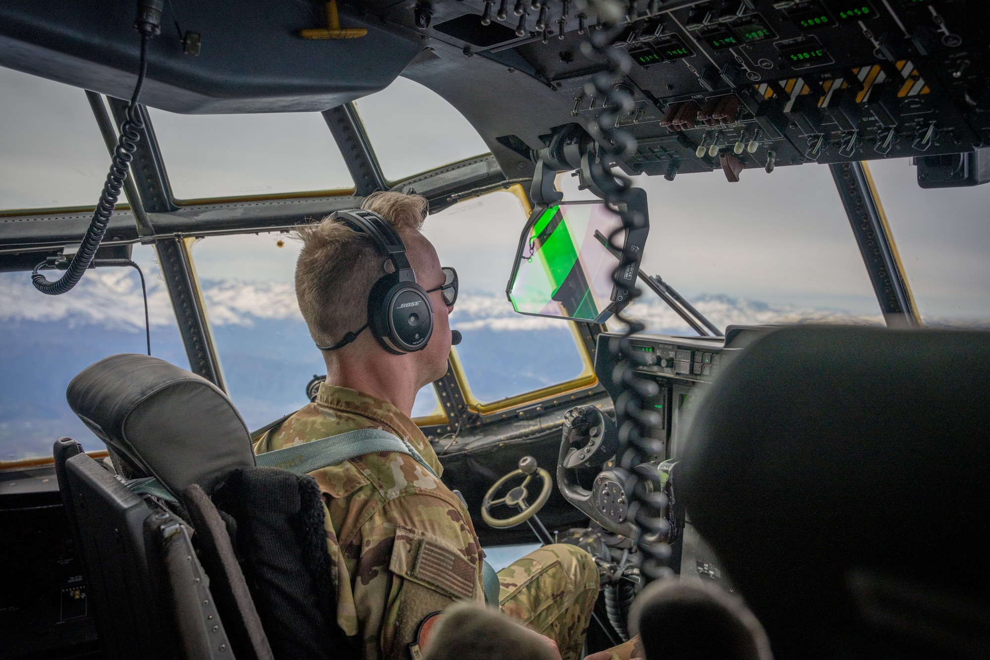 A pilot from the 39th Airlift Squadron out of the 317th Airlift Wing, Dyess AFB, TX flies a C-130J Super Hercules south of Santiago, Chile, July 28, 2023, during exercise Southern Star 23. Exercise Southern Star 23 is a Chilean-led full-scale Special Operations, Joint, and Combined Employment Exercise. The training consists of staff planning, tactical maneuvers, and collaboration among SOUTHCOM components’ staff, Chilean Armed Forces, and interagency partners during a stabilization scenario which facilitates the opportunity for participants to execute and assess the staff’s ability to plan, coordinate and execute command and control, logistical support, and decision-making processes in a crisis scenario. (U.S. Air Force photo by Staff Sgt. Clayton Wear)