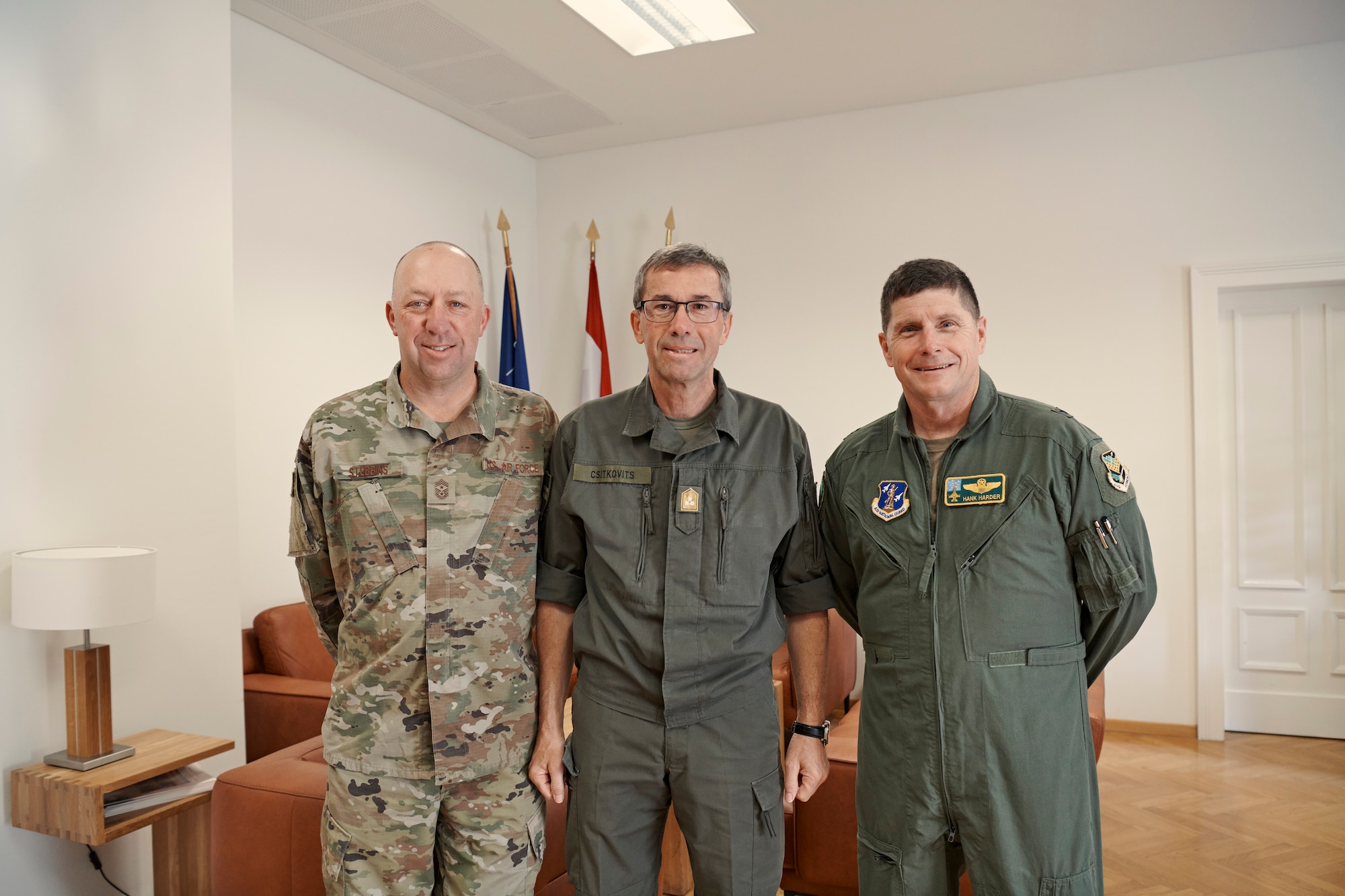Photo of Vermont Air National Guard State Command Chief Master Sgt. Jeffrey Stebbins, Commandant of the Austrian Defense Academy Lt. Gen. Erich Csitkovits and Air Component Commander of the Vermont National Guard, Brig. Gen. Henry Harder, meeting at the Austrian Defense Academy to discuss cooperation between the Austrian Armed Forces and the Vermont National Guard, Vienna, Austria, June 15, 2023.