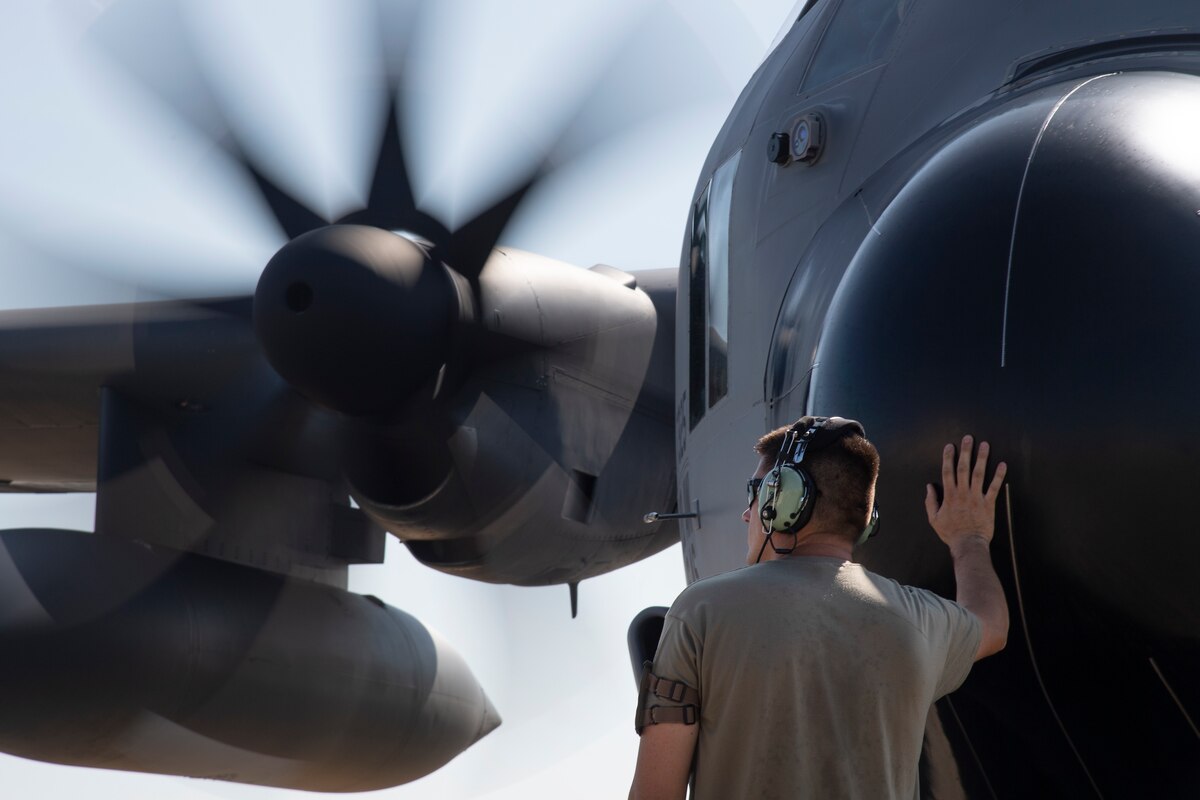 Master Sgt. Jacob Hannah, 120th Maintenance Squadron dedicated crew chief, Montana Air National Guard, prepares to marshal a C-130 Hercules assigned to the Montana ANG at Yokota Air Base, Japan, July 16, 2023, in support of Mobility Guardian 2023. Air National Guardsmen from Missouri, Montana and Connecticut worked together as one unit to during to ensure C-130s could perform rapid global mobility in support of MG23. A multilateral endeavor, MG23 features seven participating countries – Australia, Canada, France, Japan, New Zealand, United Kingdom, and the United States – operating approximately 70 mobility aircraft across multiple locations spanning a 3,000-mile exercise area from July 5-21. Our Allies and partners are one of our greatest strengths and a key strategic advantage. MG23 is an opportunity to deepen our connections with regional Allies and partners using bold initiatives. (U.S. Air Force photo by Tech. Sgt. Christopher Hubenthal)