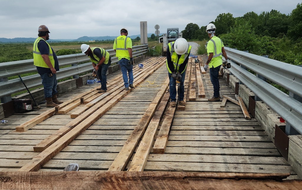 The tank bridge that provides access across the Rolling Fork River is refurbished to ensure safe access down range.