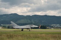 Photo of a Eurofighter Typhoons from the Austrian Air Force's Airspace Surveillance Wing, taxing at Hinterstoisser Air Base for the first ever training sortie between Vermont and Austria since signing their State Partnership Program agreement, Zeltweg, Austria, June 17, 2023