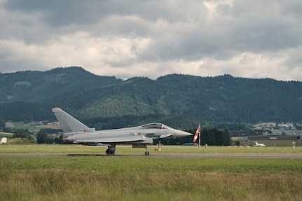 Photo of a Eurofighter Typhoons from the Austrian Air Force's Airspace Surveillance Wing, taxing at Hinterstoisser Air Base for the first ever training sortie between Vermont and Austria since signing their State Partnership Program agreement, Zeltweg, Austria, June 17, 2023