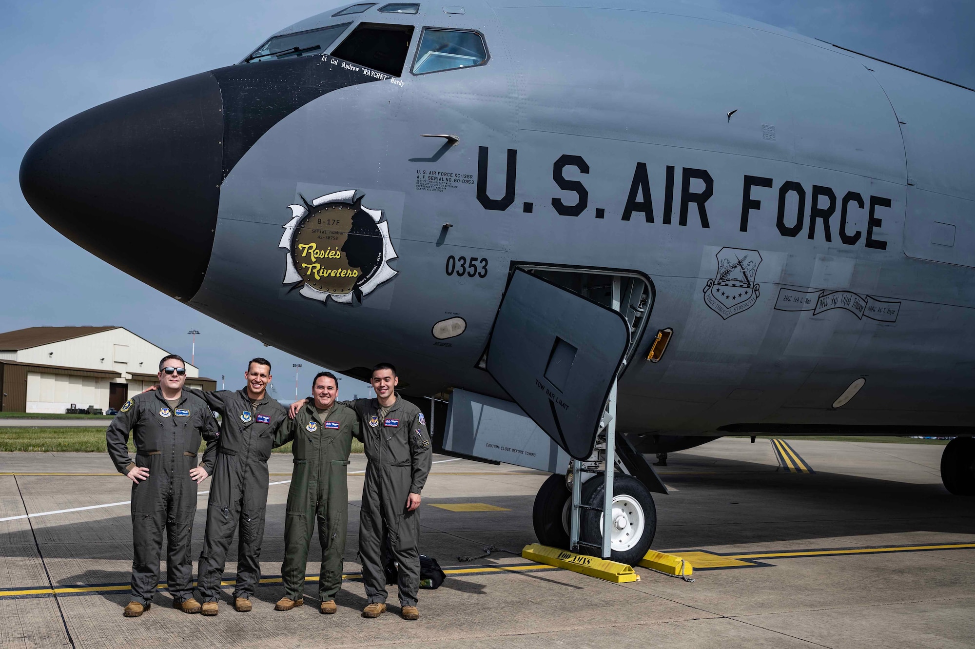 U.S. Air Force Staff Sgt. Miles Humphries (left), 351st Air Refueling Squadron KC-135 Stratotanker aircraft boom operator, Capt. Mitchell Hooper (middle left), 351st ARS pilot, Capt. Alejandro Rodriguez (middle right), 351st ARS pilot, and Senior Airman Jonathan Ross, 351st ARS KC-135 boom operator (right), stand for a group photo at Royal Air Force Mildenhall, England, Aug. 18, 2023. The 100th ARW’s KC-135s are a force multiplier that extend the reach of fighter, bomber and cargo aircraft. (U.S. Air Force photo by Senior Airman Viviam Chiu)