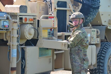 Soldiers attending the towing and recovery specialist course at the U.S. Army Reserve’s Regional Training Site – Maintenance at Fort Indiantown Gap conduct vehicle recovery training at FTIG’s mire pit on Aug. 22, 2023. The class included active-duty, Army Reserve and National Guard Soldiers. (Pennsylvania National Guard photo by Brad Rhen)