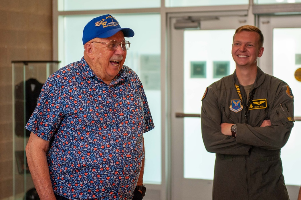 Mr. Don Peck (Left), a former U.S. Air Force Fire fighter, visits the Joe D. Brown IV Mission Training Center at Ellsworth Air Force Base, South Dakota, Aug. 17, 2023. Throughout the tour, Peck shared stories from his time serving. Peck was invited to tour the mission training center to commemorate his donations of model airplanes to the facility. (U.S. Air Force photo by Spc3 Adam Olson)