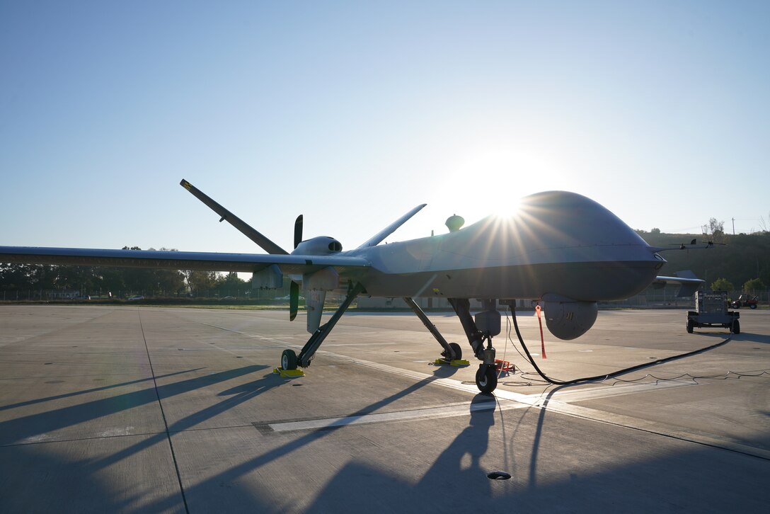 A U.S. Air Force MQ-9 Reaper, assigned to the 432nd Wing/432nd Air Expeditionary Wing, sits on the flight line during the agile combat employment (ACE) exercise known as Agile Hunter at Marine Corps Base Camp Pendleton, California, August 23, 2023. Agile Hunter saw an Air Force MQ-9 remotely piloted aircraft land on Camp Pendleton for the first time ever. (U.S. Air Force photo by Senior Airman O'Shea)