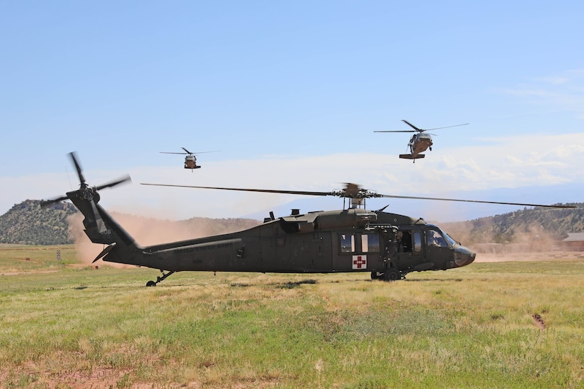 U.S. Army Reserve UH/HH-60 Black Hawks used for medical and casualty evacuation land during exercise Mountain Medic at Fort Carson, Colorado, Aug. 14, 2023. Mountain Medic is an Army Reserve-led joint, multi-component, multi-domain aeromedical evacuation exercise geared at improving and reenforcing medical evacuation operations in a simulated large-scale combat operations environment.