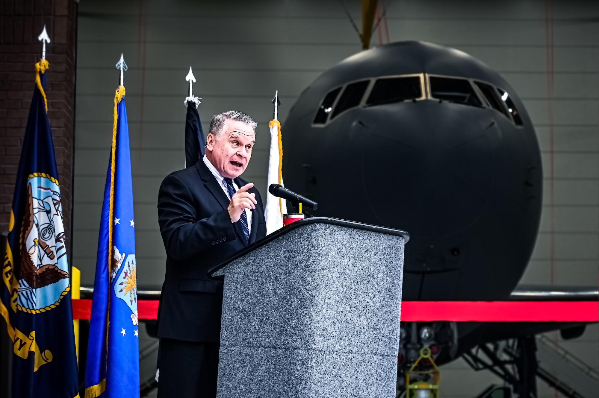 Joint Base Leadership and personnel attend a ribbon cutting ceremony for the opening of the 305th Air Mobility Wing’s Dock 46 Two-Bay Hangar at Joint Base McGuire-Dix-Lakehurst, N.J. on 24 Aug. 2023. New Jersey 4th District Congressman Chris Smith addressed the audience on the strategic value the facility brings to the KC-46A Pegasus refueling mission. The event concludes four and a half years of planning and 240,650 accident-free man-hours after its initial groundbreaking on December 3, 2018. A military construction project valued at nearly $54 million, the hangar will serve as a mission-critical asset in the KC-46A Pegasus' ability to provide Rapid Global Mobility for the Joint Force.