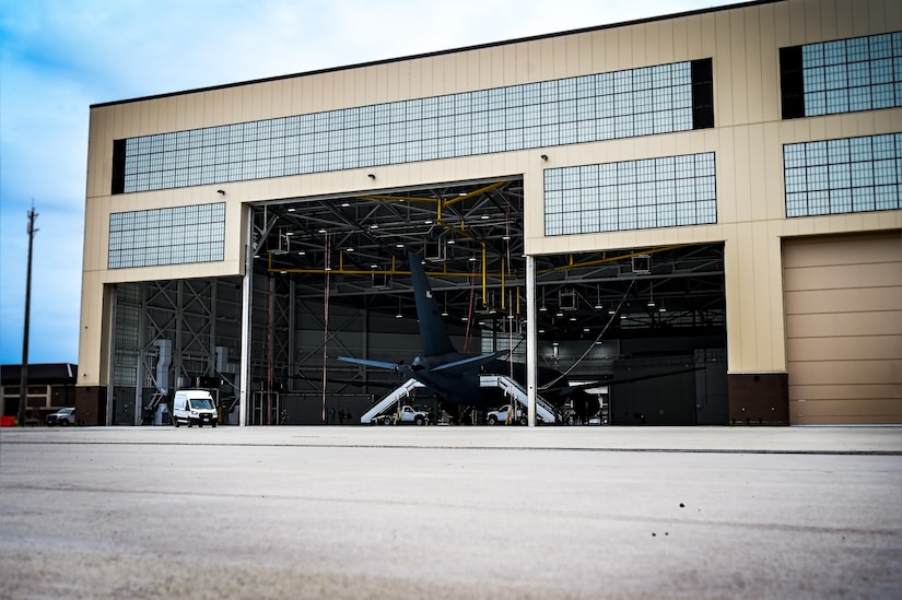 Joint Base Leadership and personnel attend a ribbon cutting ceremony for the opening of the 305th Air Mobility Wing’s Dock 46 Two-Bay Hangar at Joint Base McGuire-Dix-Lakehurst, N.J. on 24 Aug. 2023. New Jersey 4th District Congressman Chris Smith addressed the audience on the strategic value the facility brings to the KC-46A Pegasus refueling mission. The event concludes four and a half years of planning and 240,650 accident-free man-hours after its initial groundbreaking on December 3, 2018. A military construction project valued at nearly $54 million, the hangar will serve as a mission-critical asset in the KC-46A Pegasus' ability to provide Rapid Global Mobility for the Joint Force.