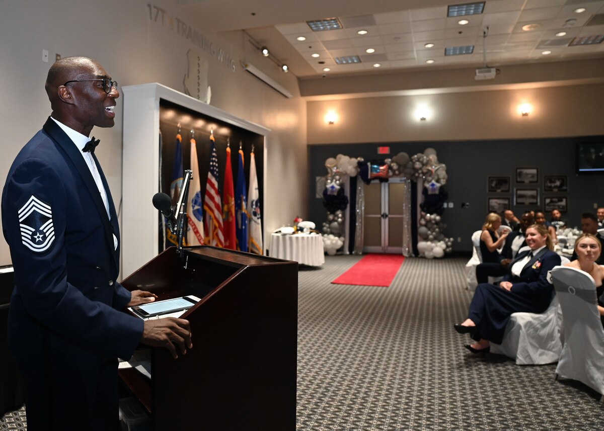 U.S. Air Force Chief Master Sgt. Hamp Lee III, Program Manager for Air Force Handbook 1, Airman, speaks during the Senior Noncommissioned Officer Induction Ceremony at the Powell Event Center, Goodfellow Air Force Base, Texas, Aug. 18, 2023. Lee was stationed at Goodfellow in 2012 where he served as a first sergeant for the 316th Training Squadron. During his speech, he spoke on the values of being an interpersonal leader and being a resource for the junior enlisted force. (U.S. Air Force photo by Airman 1st Class Evelyn D’Errico)