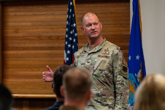 U.S. Air Force Col. Joshua DeMotts, the 99th Air Base Wing commander, gives closing remarks during an honorary commander induction ceremony at Nellis Air Force Base, Nevada, Aug 18, 2023. The honorary commanders program provides an opportunity for Southern Nevada area community leaders and Nellis leaders to exchange ideas, share experiences and foster a supportive relationship with the community. (U.S. Air Force photo by Airman 1st Class Jordan McCoy)