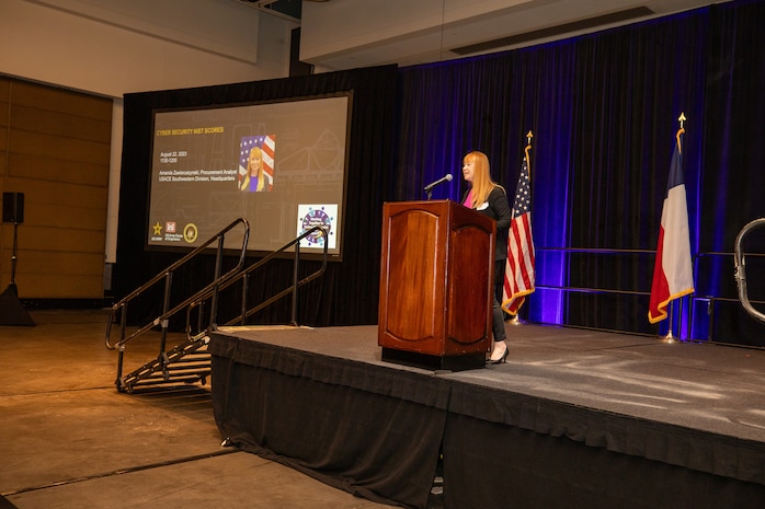 Amanda Zawieruszynski, Procurement Analyst, U.S. Army Corps of Engineers (USACE), Southwestern Division (SWD), speaks about “Cyber Security National Institute of Standards and Technology (NIST) Scores” at the USACE, Galveston District semi-annual Stakeholder Partnering Forum with non-federal sponsors, customers and agency partners at the Moody Gardens Convention Center in Galveston, Texas, Aug. 22, 2023.
