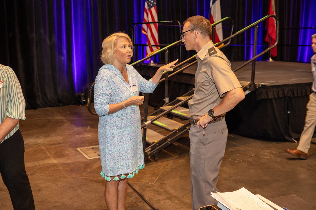 Col. Rhett Blackmon, U.S. Army Corps of Engineers (USACE), Galveston District, commander, speaks with Rhonda Gregg Hirsch, Atkins Global, project director, during a break at the USACE, Galveston District semi-annual Stakeholder Partnering Forum with non-federal sponsors, customers and agency partners at the Moody Gardens Convention Center in Galveston, Texas, Aug. 22, 2023.