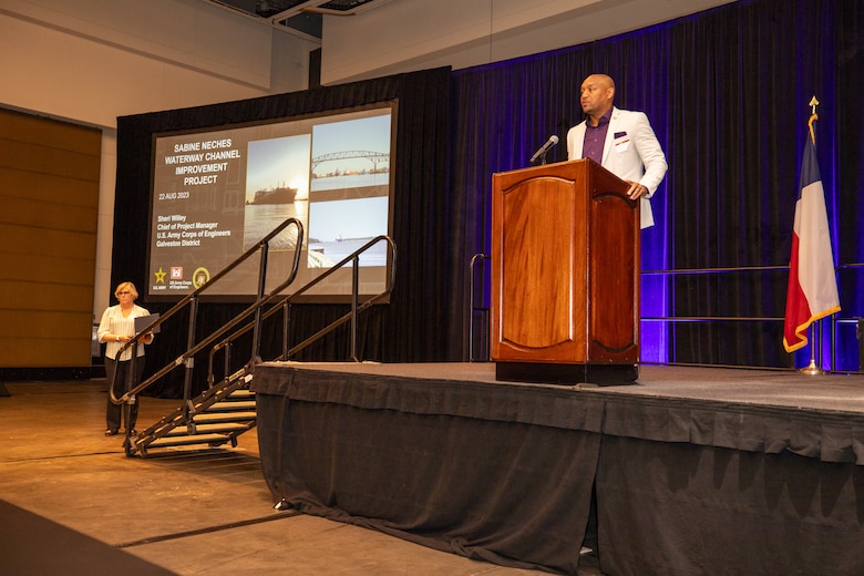 Byron Williams, U.S. Army Corps of Engineers (USACE), Galveston District, deputy district engineer, introduces Sheri Willey, USACE, Galveston District, Project Management Branch chief, at the Galveston District semi-annual Stakeholder Partnering Forum with non-federal sponsors, customers and agency partners at the Moody Gardens Convention Center in Galveston, Texas, Aug. 22, 2023.