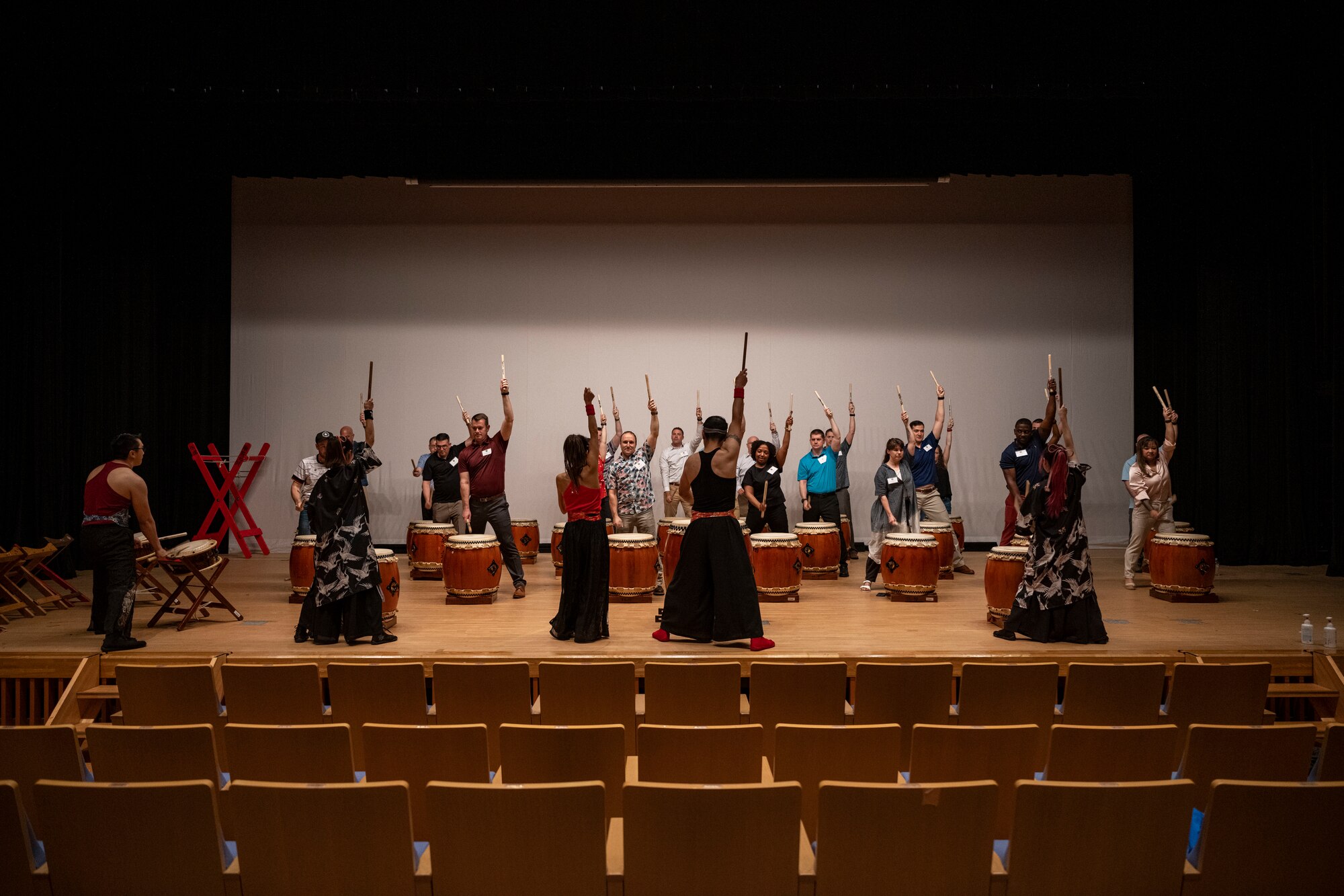 Commanders and senior enlisted leaders assigned to the 35th Fighter Wing prepare to play traditional Japanese taiko drums during a team building event at the Misawa International Center.