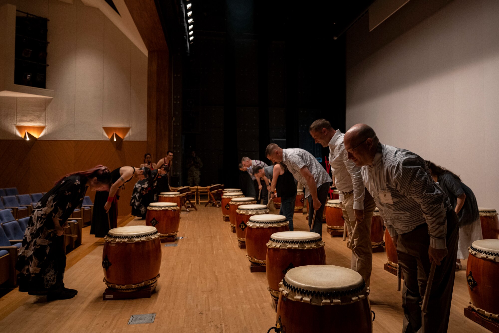 Commanders and senior enlisted leaders assigned to the 35th Fighter Wing bow to instructors during a team building event at the Misawa International Center.