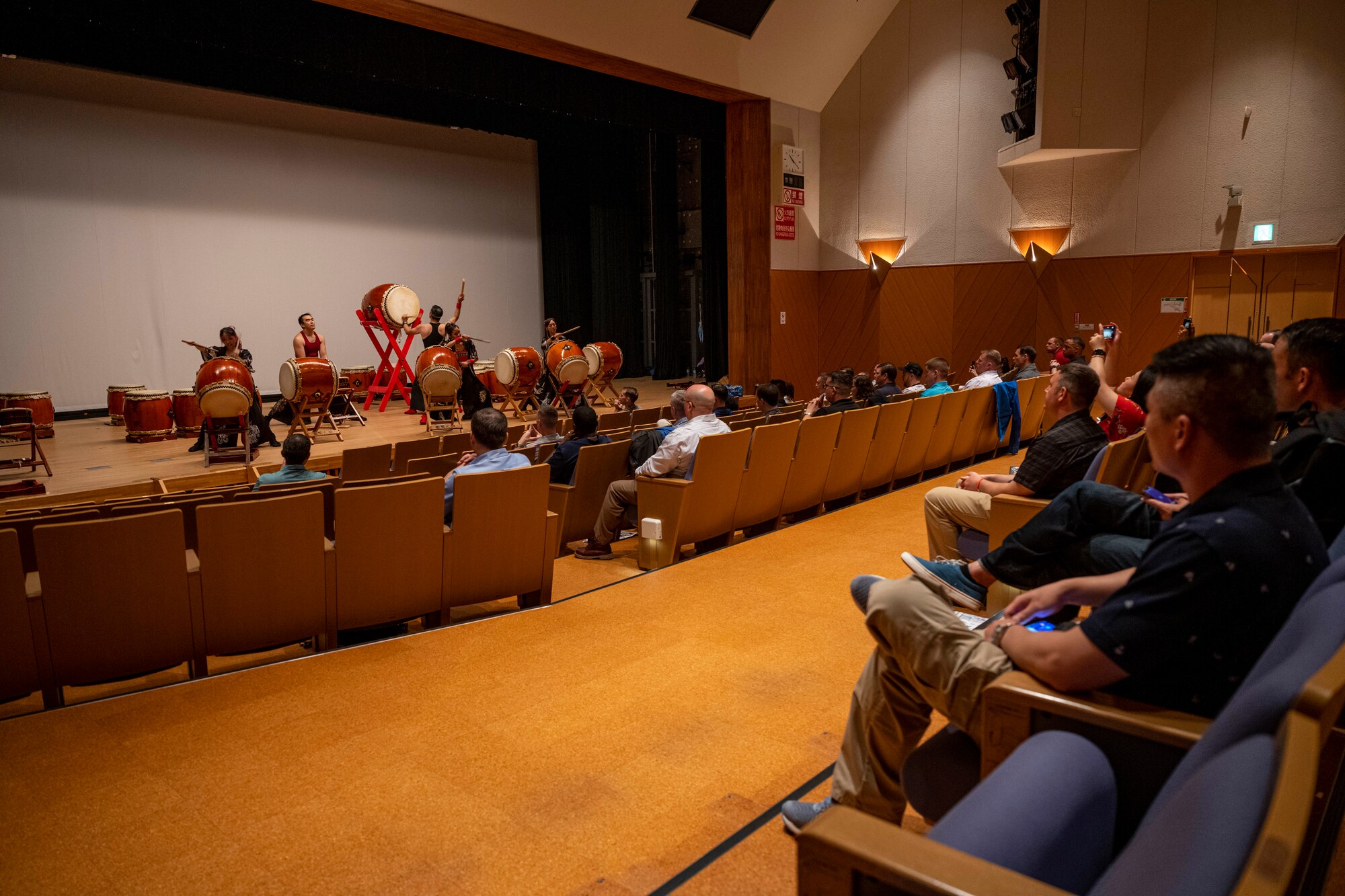 Commanders and senior enlisted leaders assigned to the 35th Fighter Wing watch a performance by traditional Japanese taiko drum instructors during a team building event at the Misawa International Center.