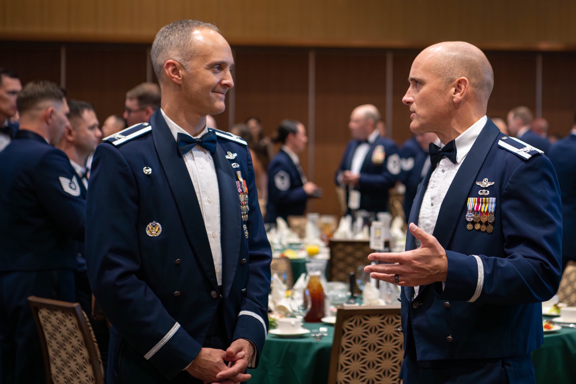 18th Wing commander and deputy commander attending the SNCO induction ceremony